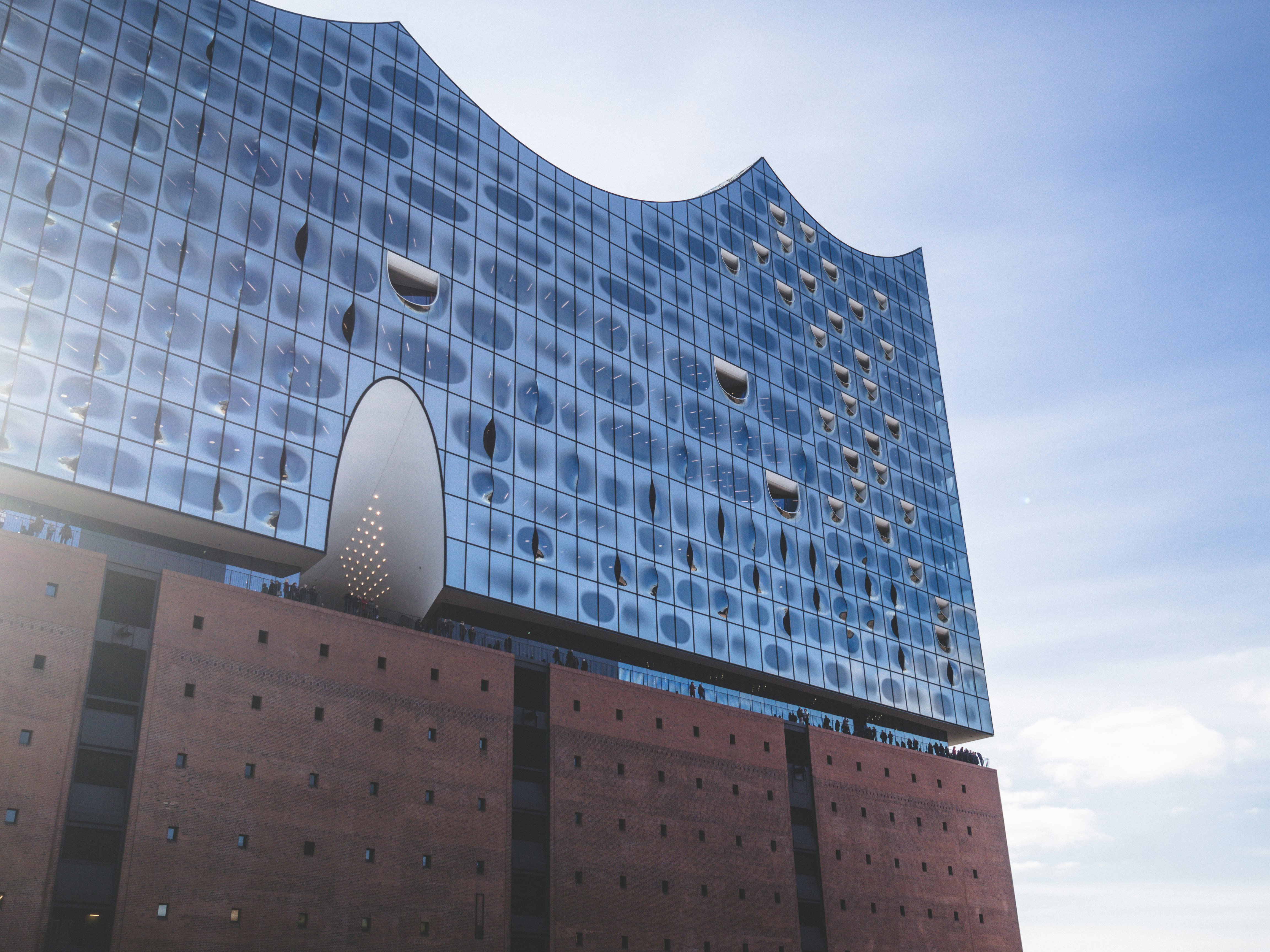 white and blue concrete building under blue sky during daytime